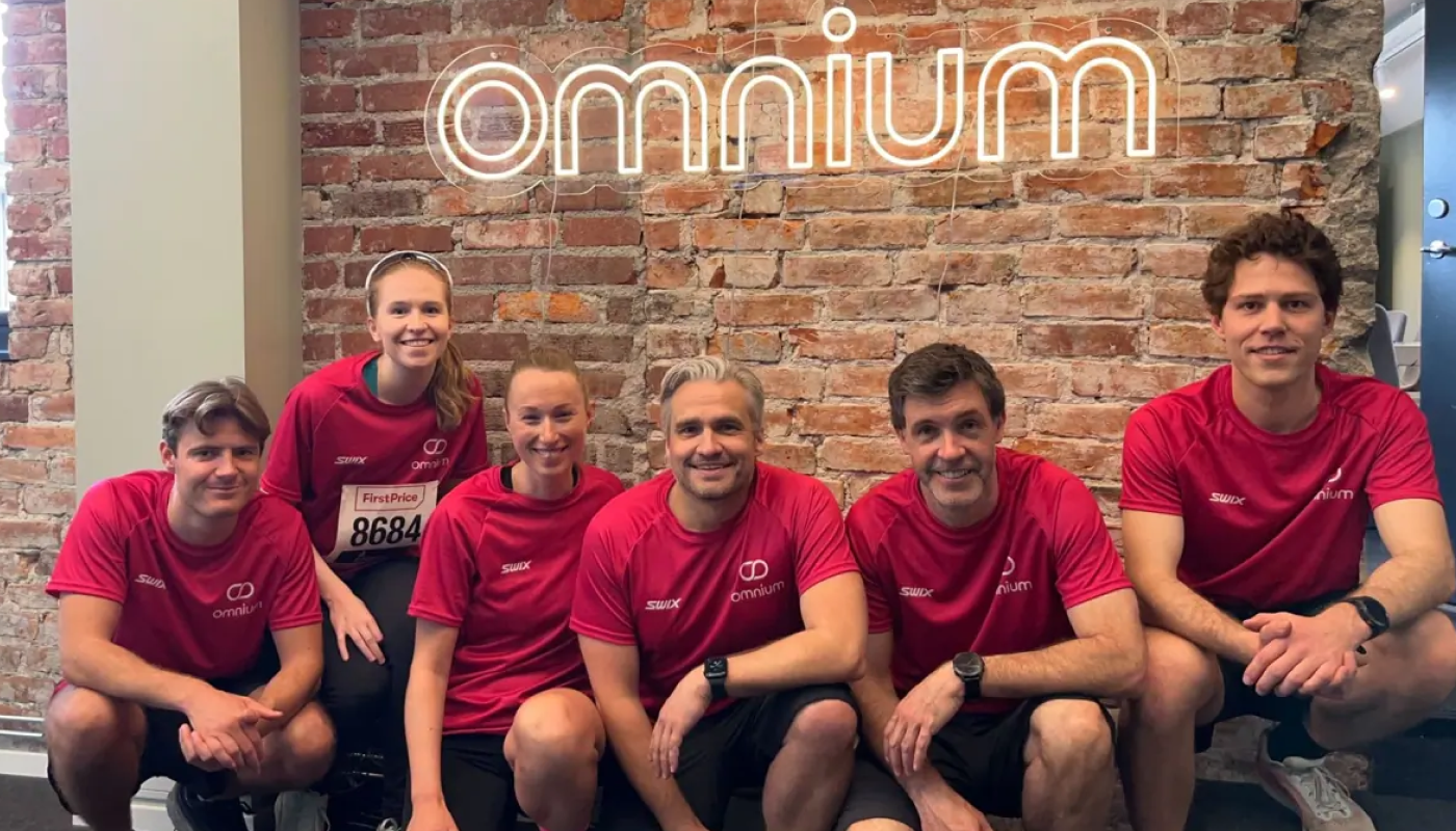 Omnium team in matching jerseys after a race