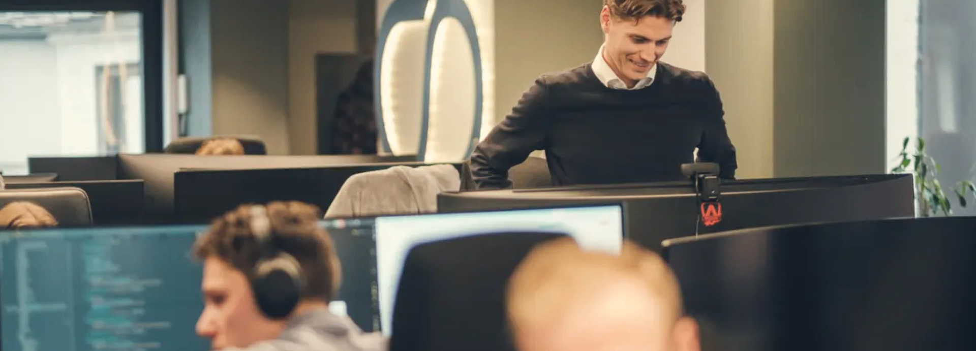 Omnium team members working in the office
